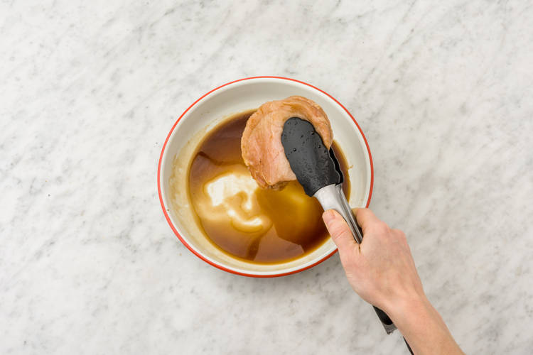Shake off any excess sauce