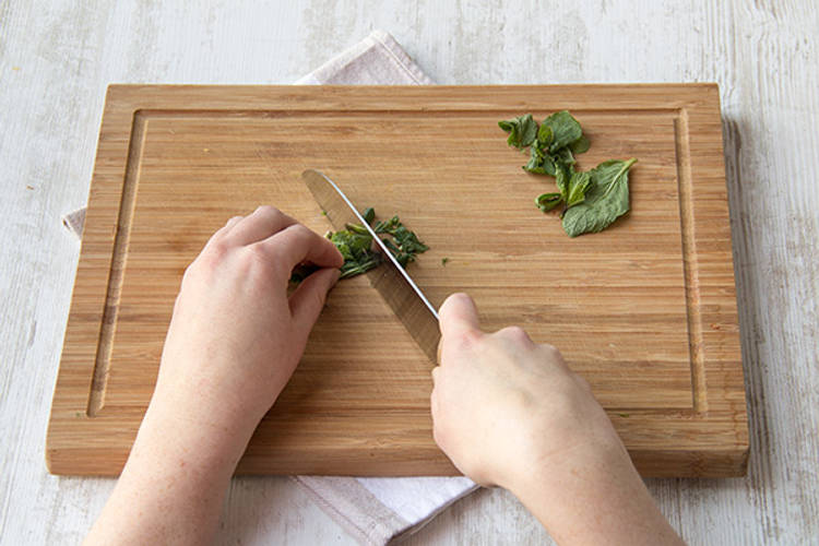Roughly chop half the mint