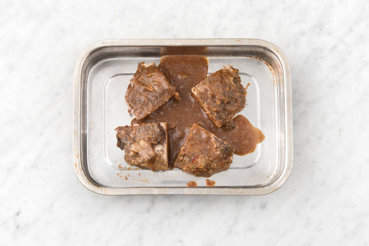 Cut the pork into four pieces