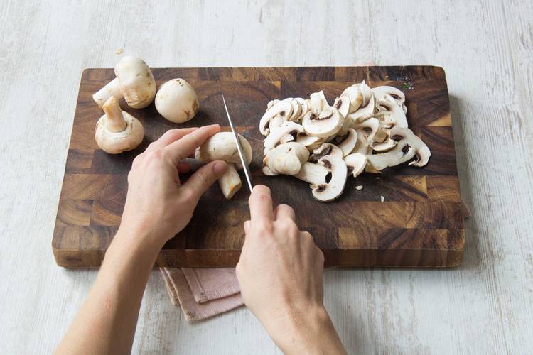 Slice the button mushrooms