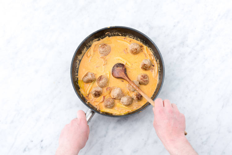 Cook the meatballs in the curry sauce