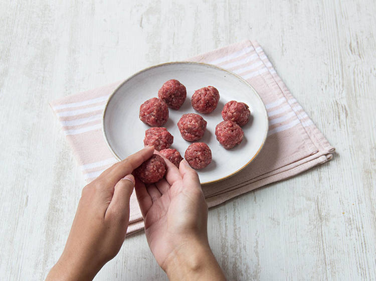Roll mince into meatballs