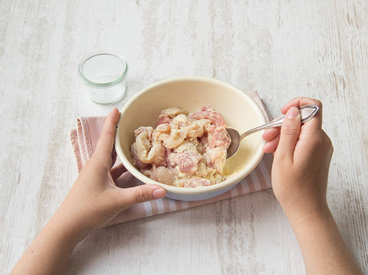 Toss the chicken in cornflour
