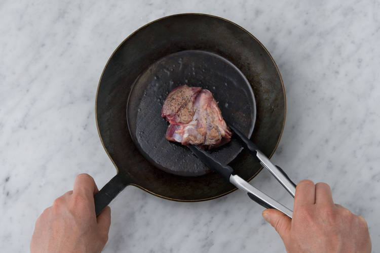 Sear the lamb on each side