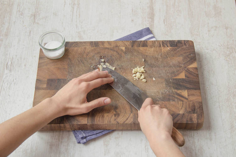 Peel and chop garlic.