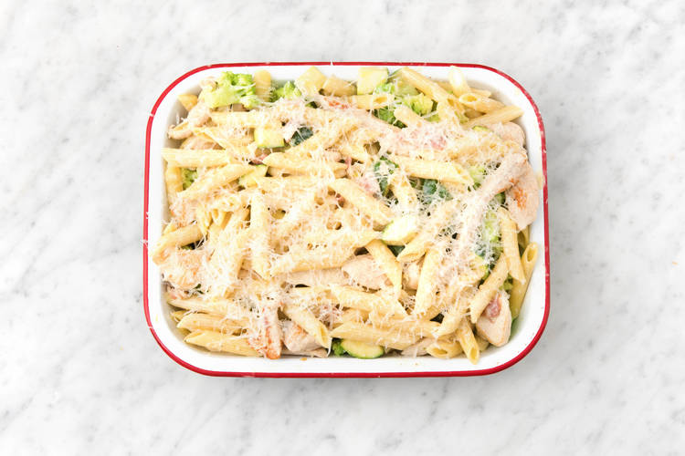 Assemble pasta bake.