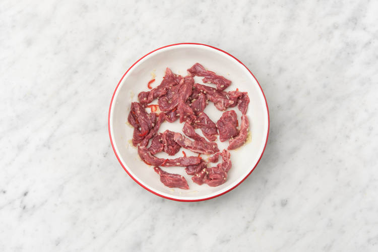 Marinate the beef strips