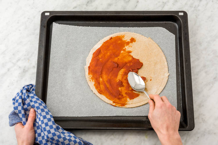 Spread the tomato paste
