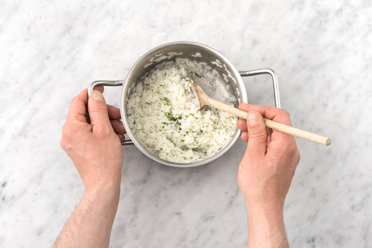 Stir through half the coriander and the butter
