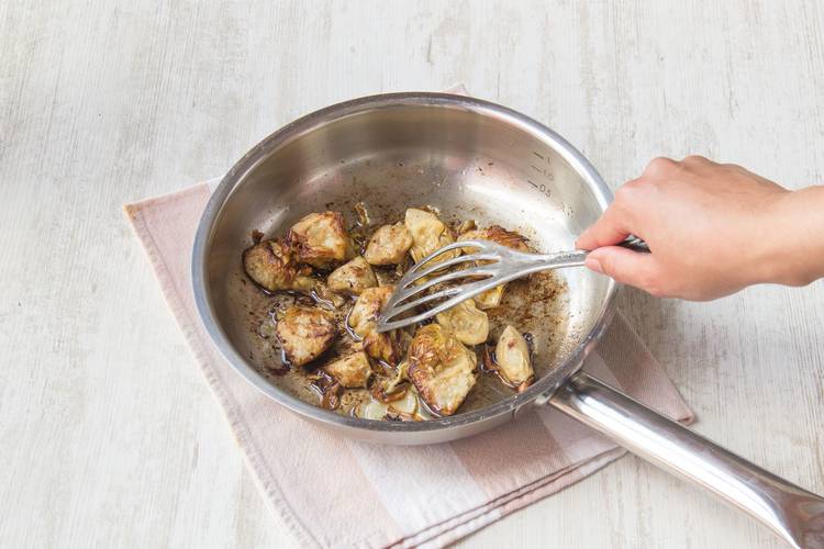 Cook the artichokes