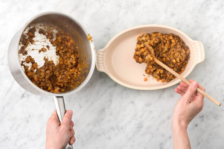Transfer the lentil mixture into a medium baking dish