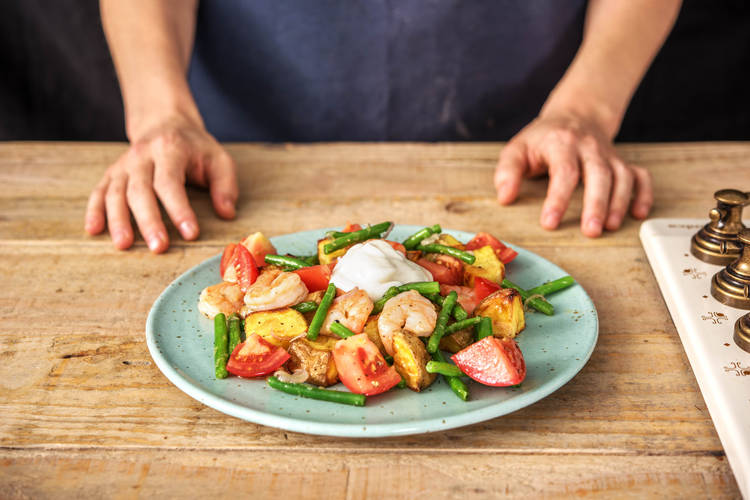 Cook prawns.