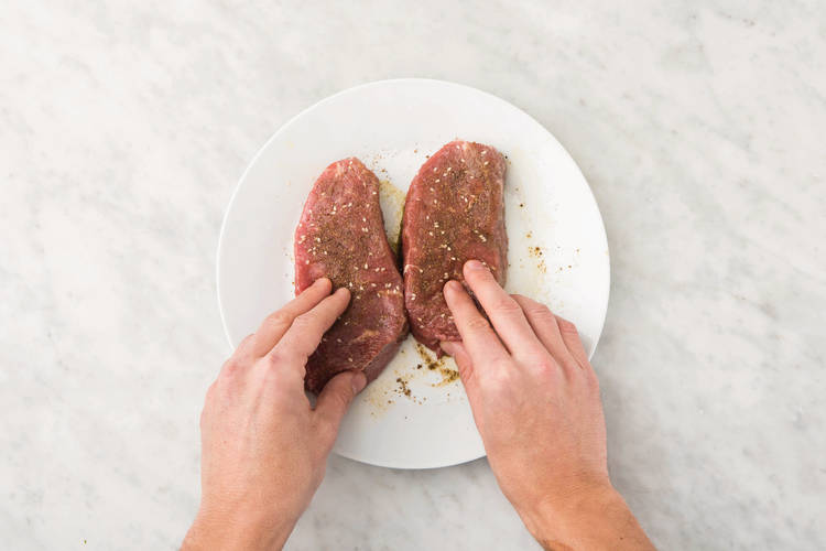 Add flavour to the steaks