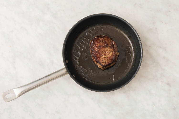 Cook the steak on each side