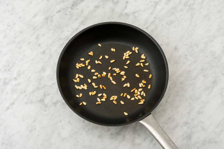 Rooster de pijnboompitten