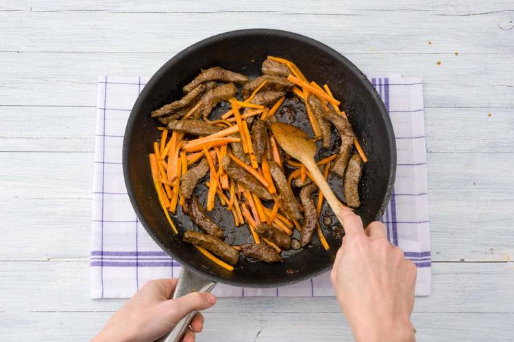 Toss the beef with veggies