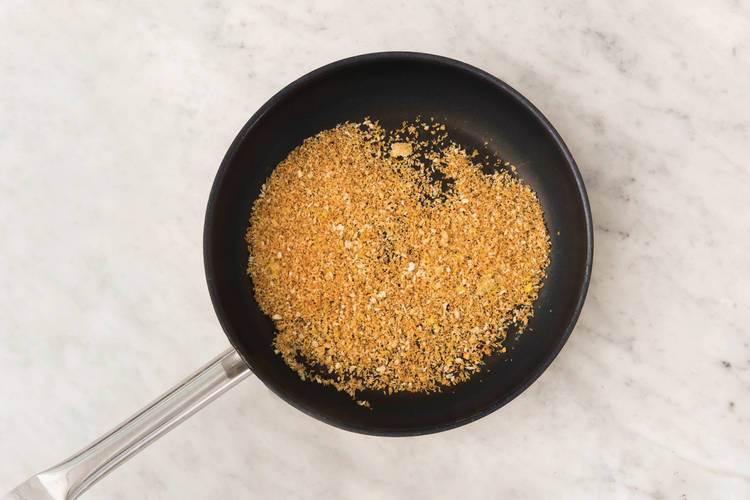 Toast the pine nuts