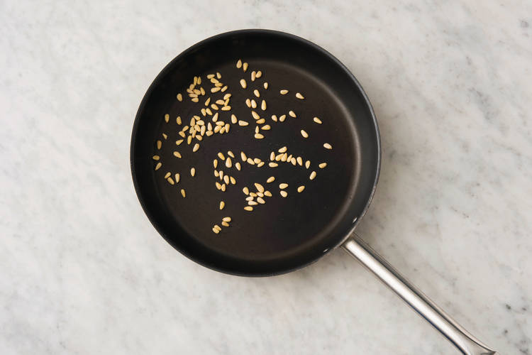 Toast the pine nuts
