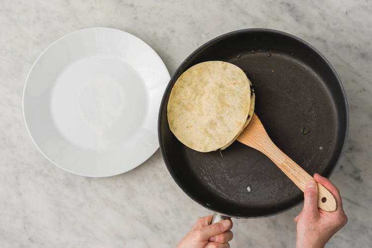 Flip the quesadillas