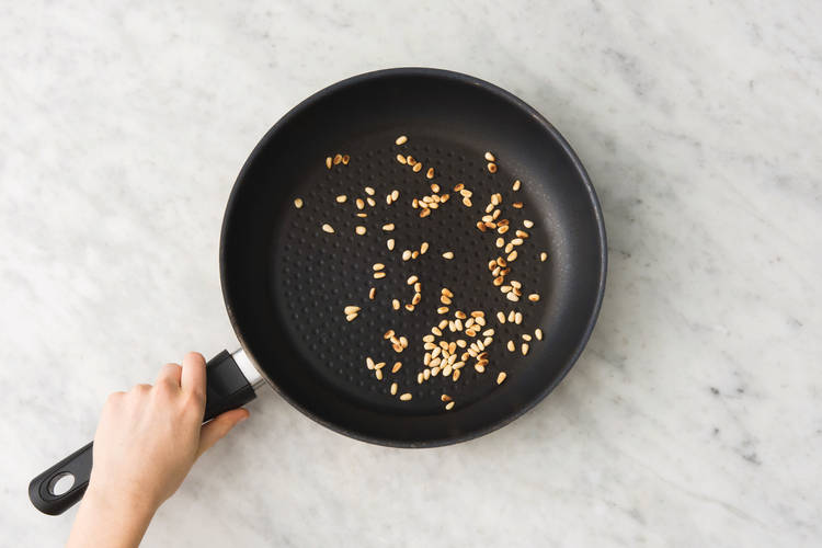 Toast the pine nuts