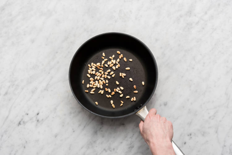 Toast the pine nuts