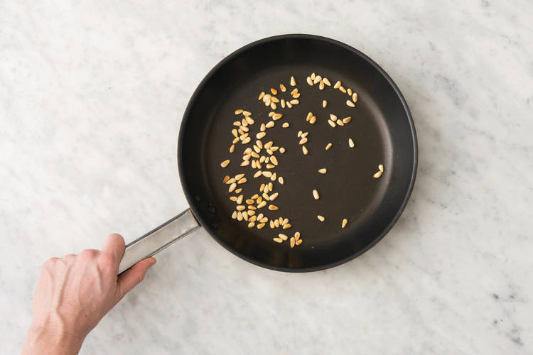 Toast the pine nuts