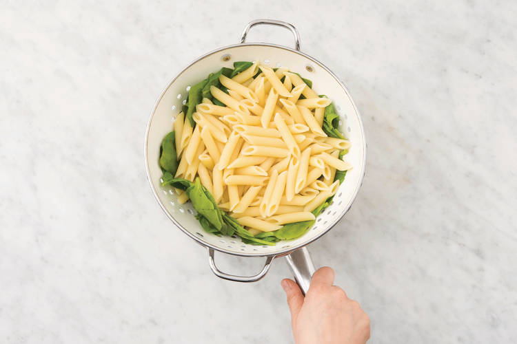 Cook the pasta and spinach