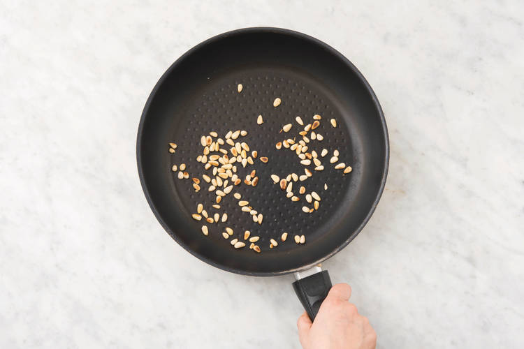 Toast the pine nuts