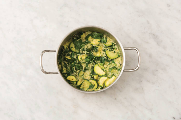 Add greens to the risoni