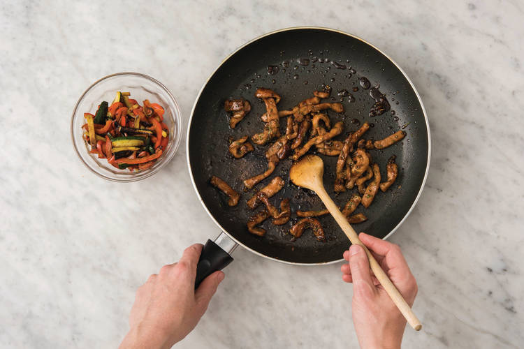 Cook the pork and veggies