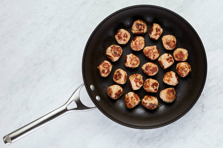 Cook Carrots and Brown Meatballs