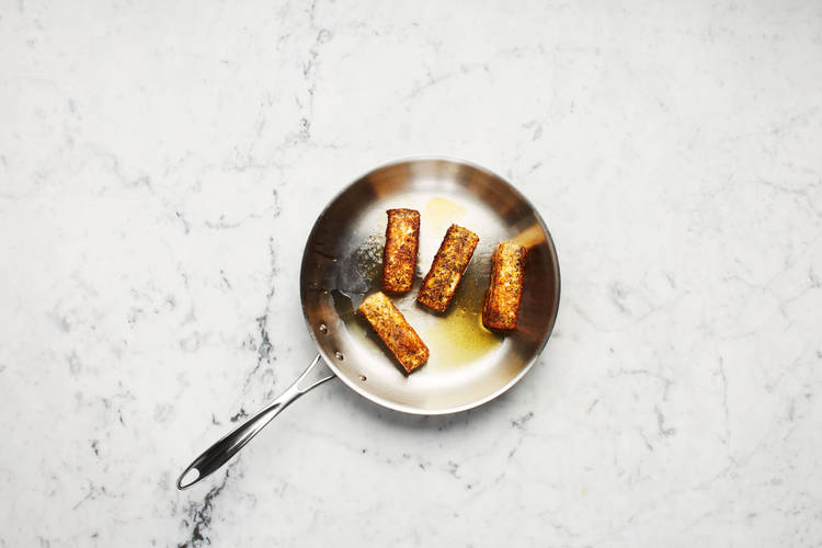 Cook Grilling Cheese