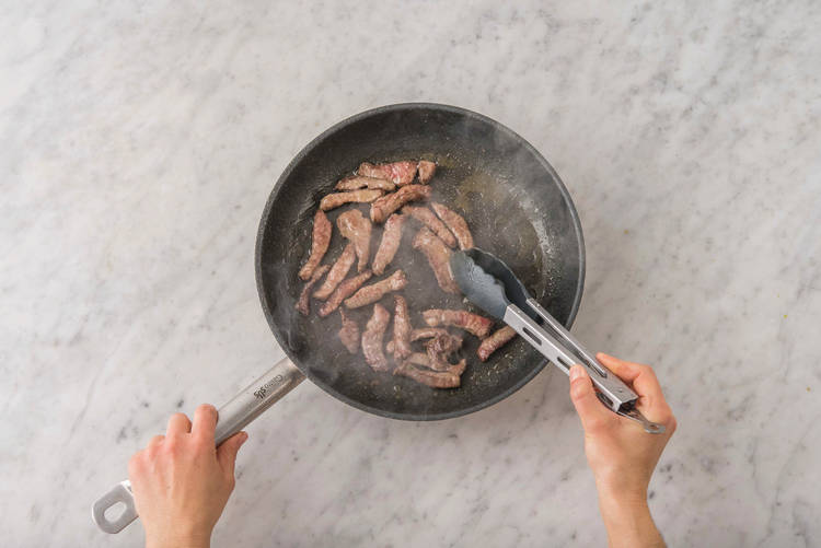 Brown the beef strips