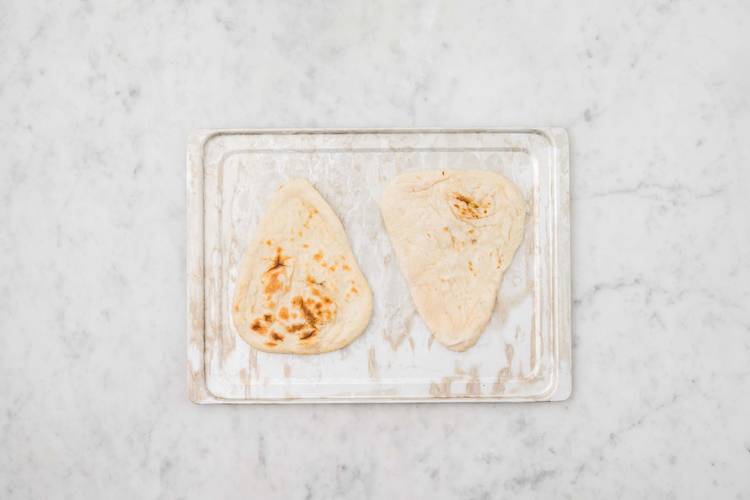 Warm the naan