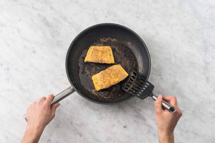 Cook salmon and make herby mayo