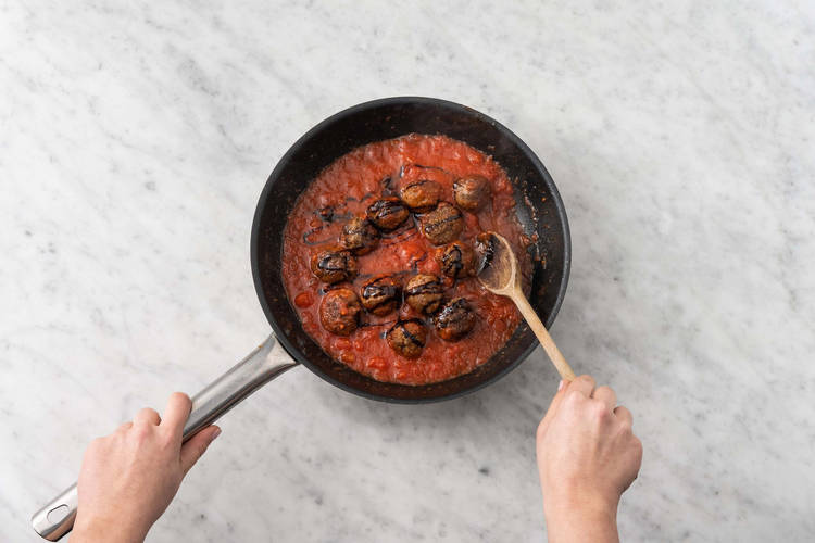 Cook meatballs and sauce