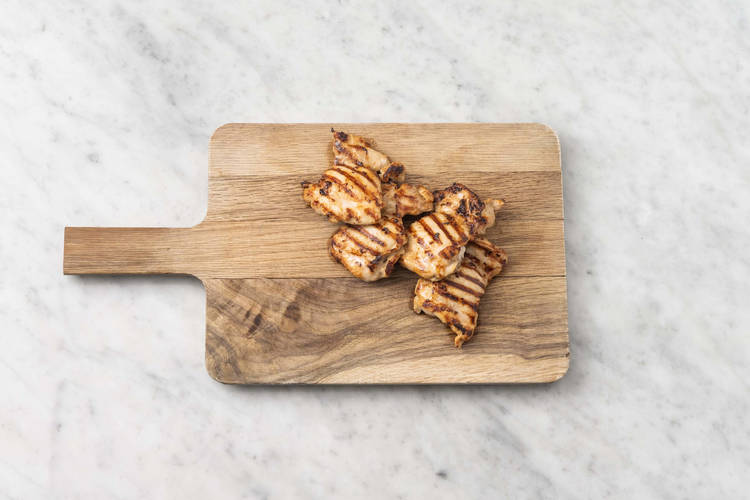 Cook chicken and warm tortillas