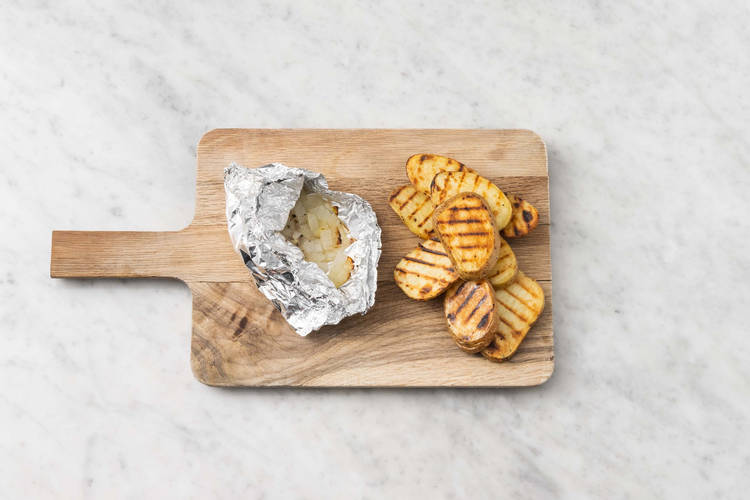 Grill potatoes and onions