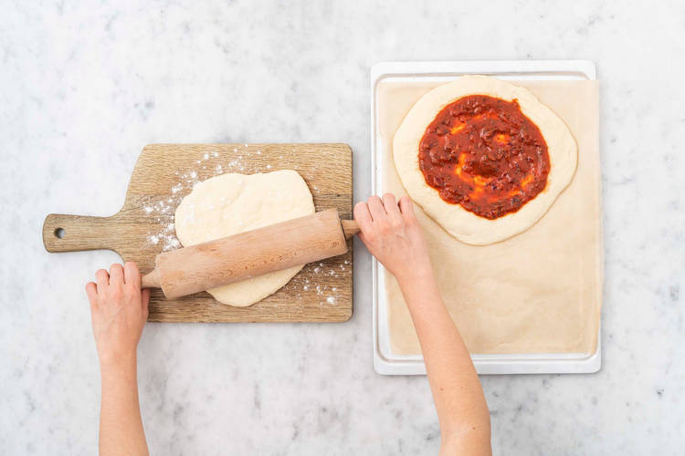 Pizzadeeg uitrollen
