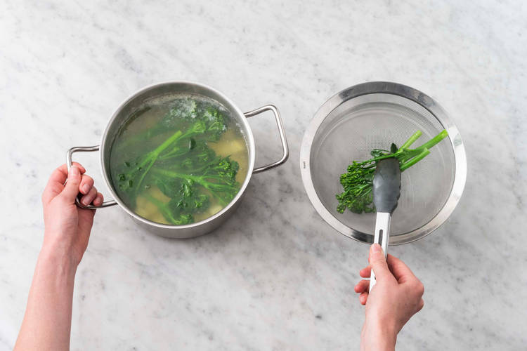 Cook potatoes and broccolini