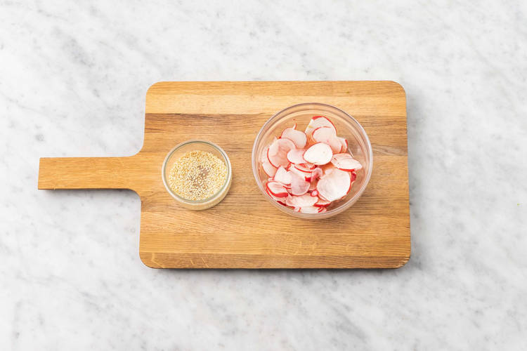 Toast sesame seeds and pickle radishes