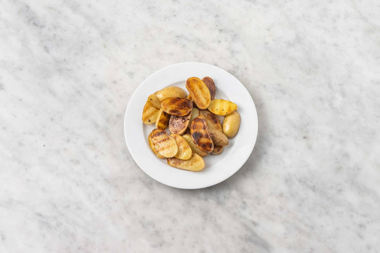 Grill potatoes and onions