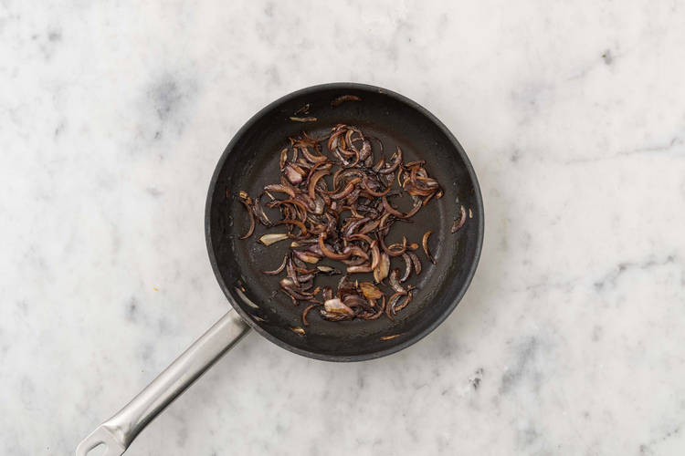 Cook onions and make burger sauce