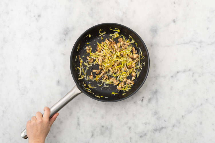 Cook mushrooms and leeks
