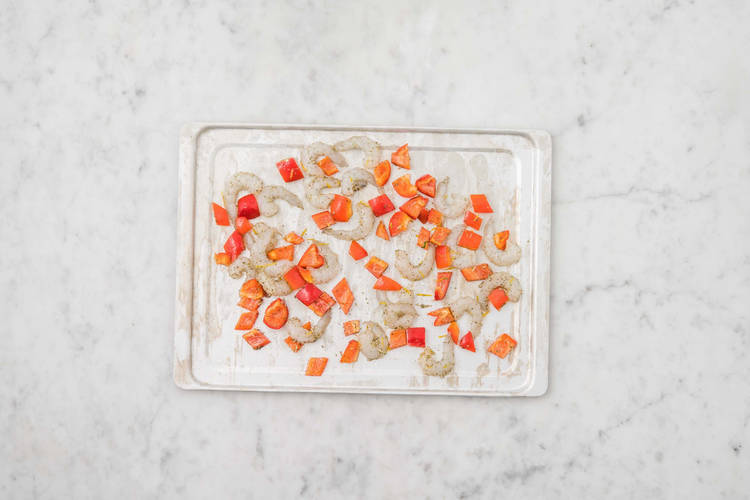 Broil shrimp and peppers