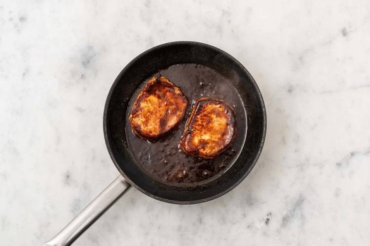 Glaze your Steaks Once the pork is cooked, drain