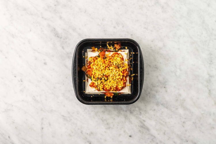 Assemble enchilada casserole