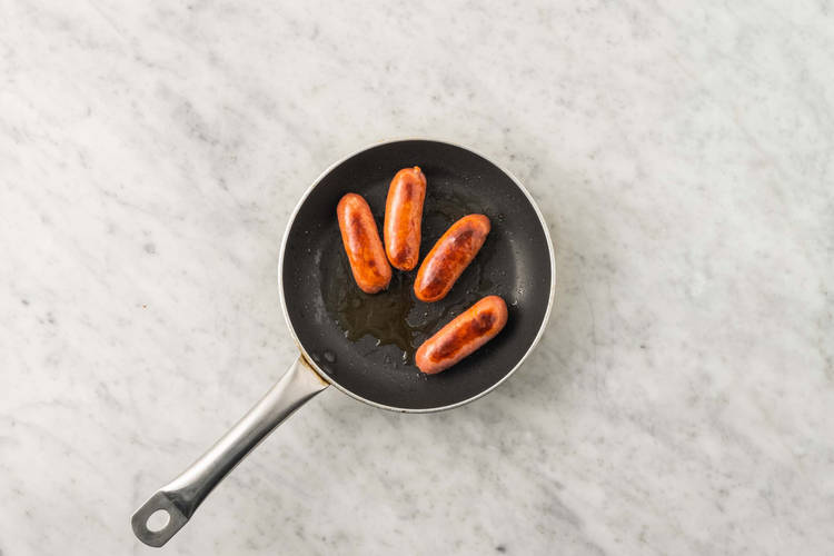 Cuire les merguez de poulet