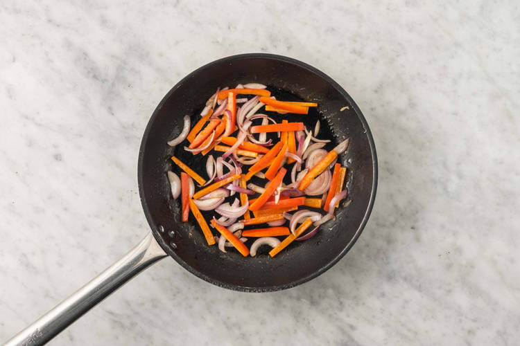 Cook peppers and onions