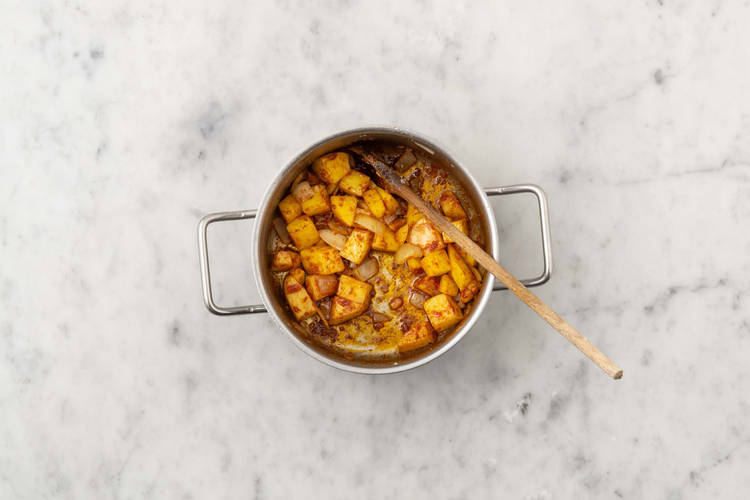 Cook veggies and spices